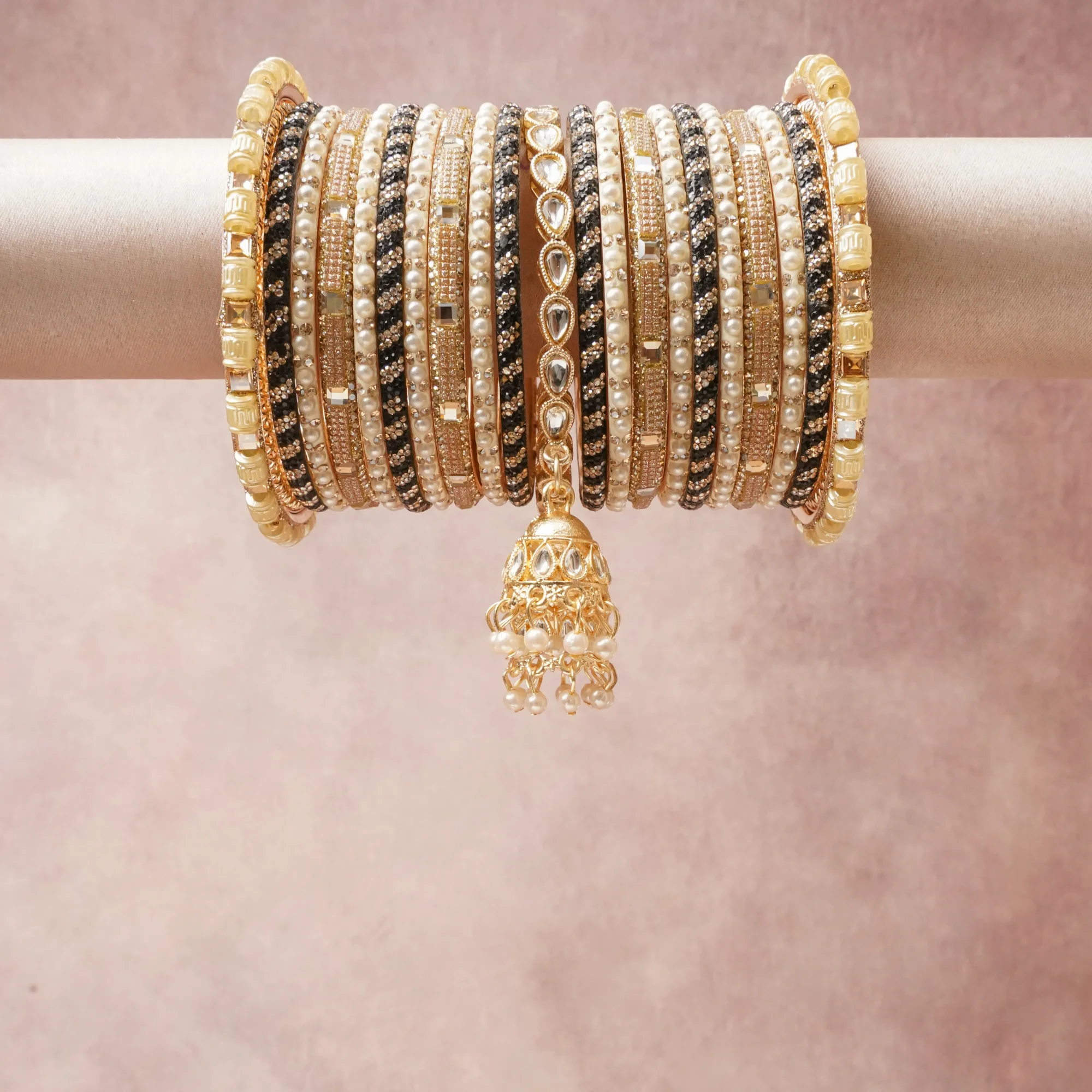 A majestic Gold & Green set, complemented by Clear Cubic Zirconia, Pearl Luster featuring Gold-plated Metal, Simulated Pearl, Cubic Zirconia, Textile Thread.
Rich, ceremonial, and designed to be passed through generations.